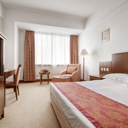 Starway Donglin Hotel Уси Номер фото